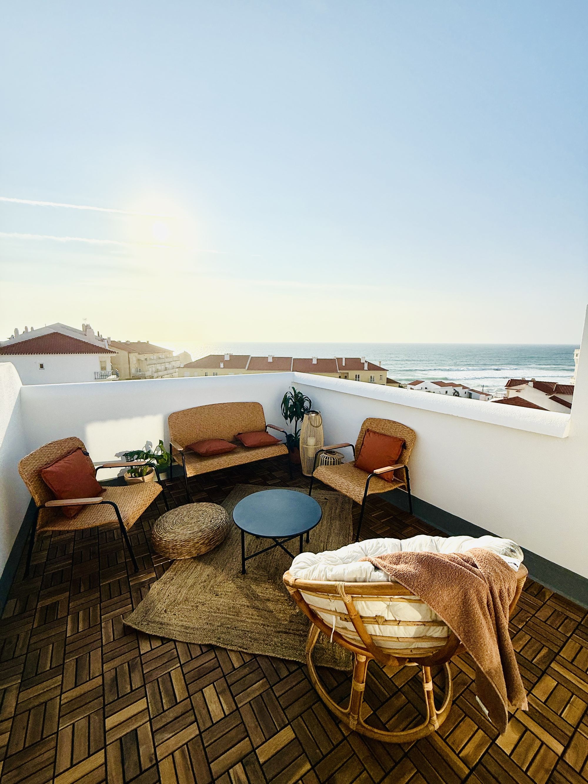 The rooftop terrace at Casa Cruz do Mar, looking out over the rooftops to the Atlantic